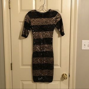 Gold and black sequin dress